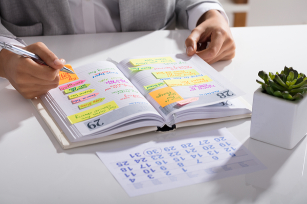 Someone organizing their schedule