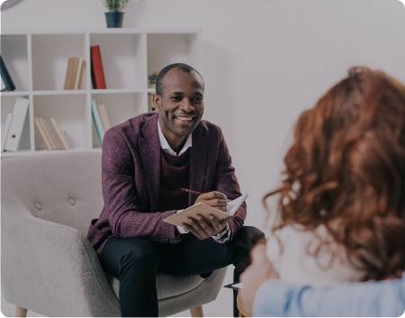 Mental Health Professional speaking with a client