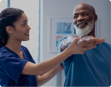 Physiotherapist - Black gentleman at a session